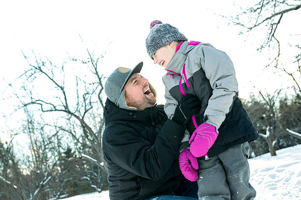 istock Young daughter father winter 504750174