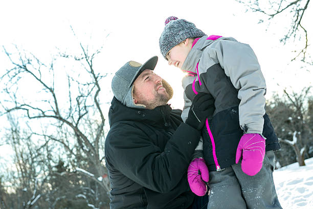 istock Young daughter father winter 504750204