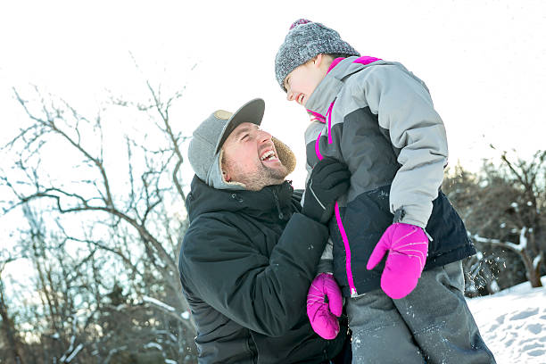 istock Young daughter father winter 504750242