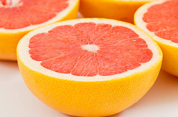 istock Half a red tasty red grapefruit 504750258