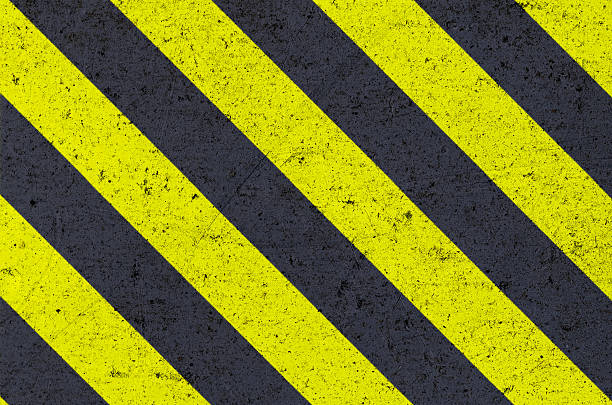 istock Warning sign on metal texture 504750632