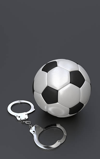 istock Soccer ball with handcuffs 504751480
