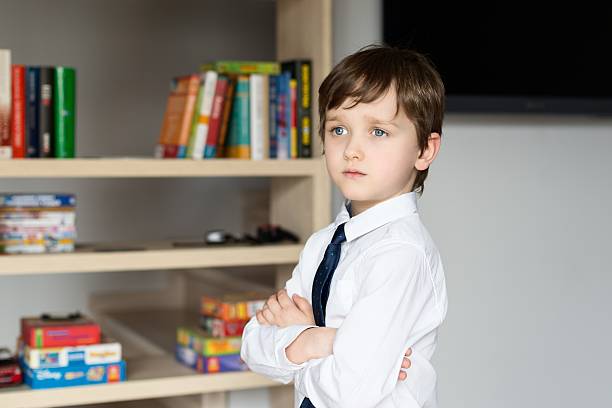 istock Elegantly dressed in a white shirt and tie little boy 504751564