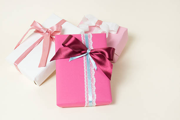 istock Packed gifts on a light (beige) background, not isolated 504751718