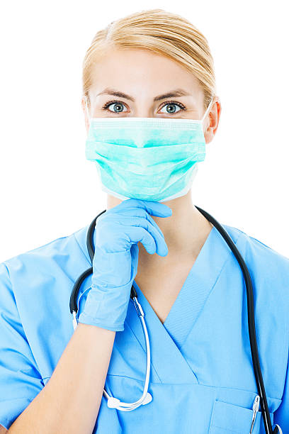 istock Nurse Wearing Surgical Mask Over White Background 504752842