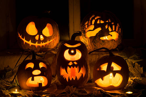 istock Photo composition from five pumpkins for Halloween. 504753990
