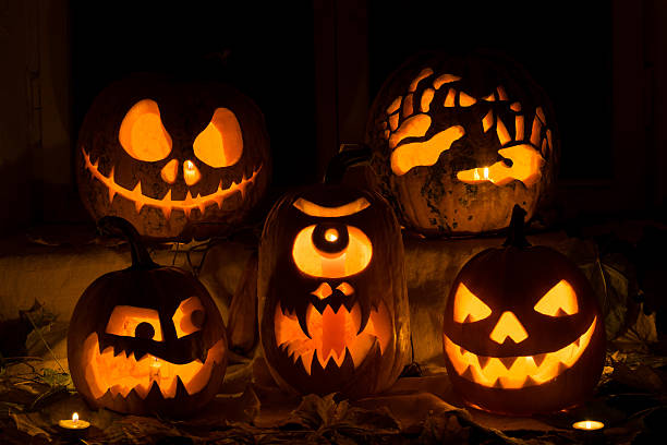 istock Photo composition from five pumpkins on Halloween. 504754018