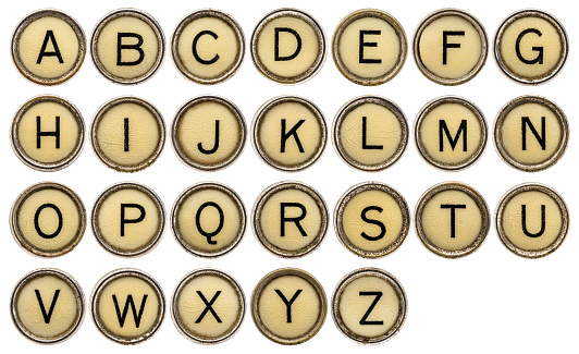 full in English alphabet  in old round typewriter keys isolated on white