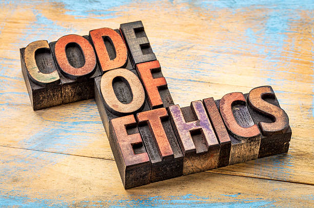 code of ethics bannert in wood type stock photo