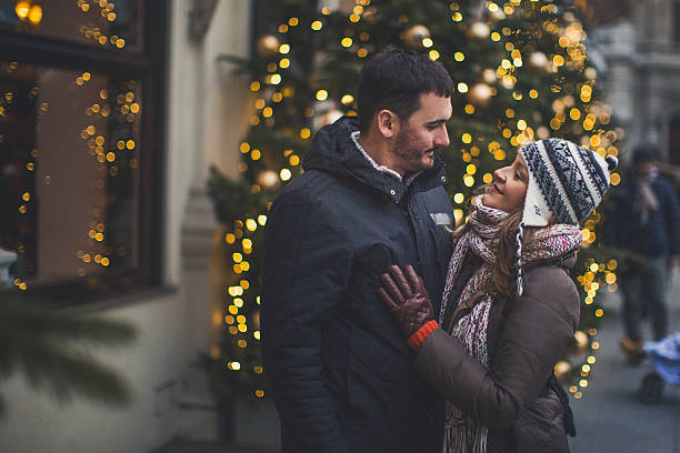 istock Lovely couple in front of Christmas tree 504756094