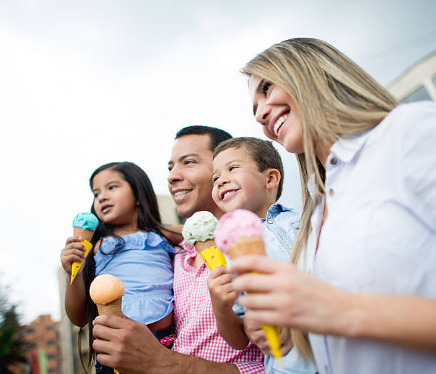istock Happy family eating ice creams 504757092