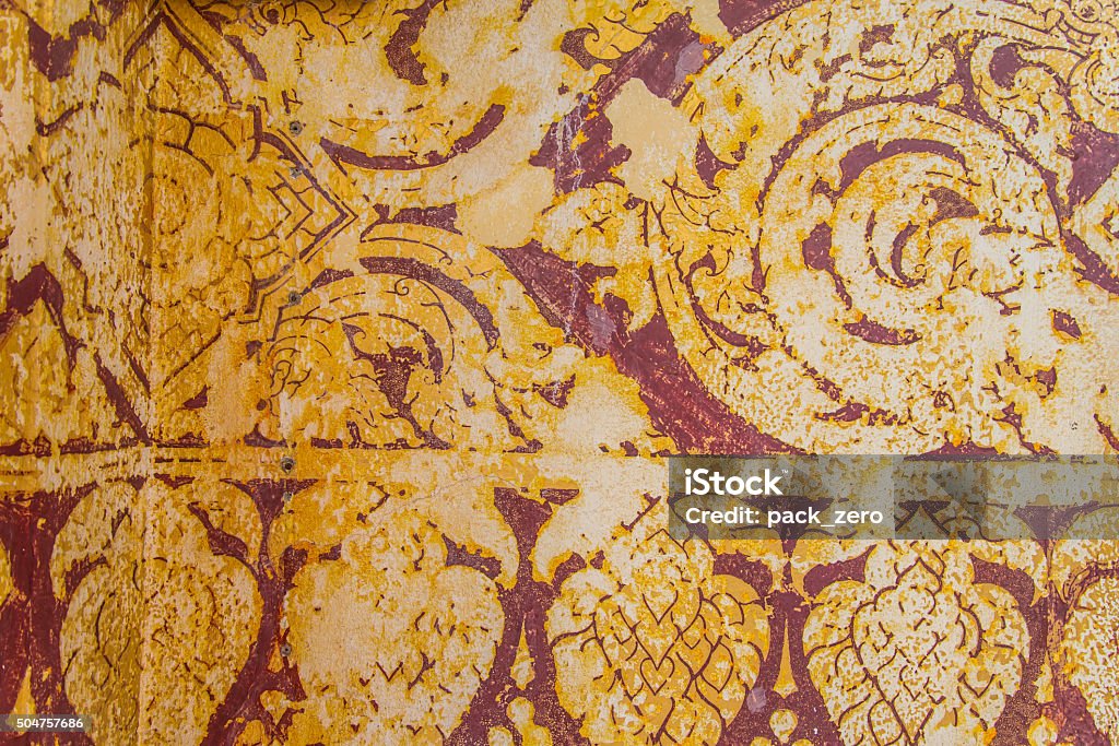 Thailand ancient striped Thailand ancient striped on the wall.Temple of Thailand. Adult Stock Photo
