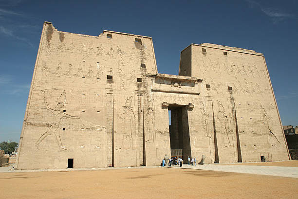 istock Visitors enter the massive Temple of Edfu Egypt 504757836