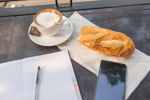 Cappucino and bread are perfect for a new working day Cappucino and bread are perfect for a new working day sandwich new hampshire stock pictures, royalty-free photos & images