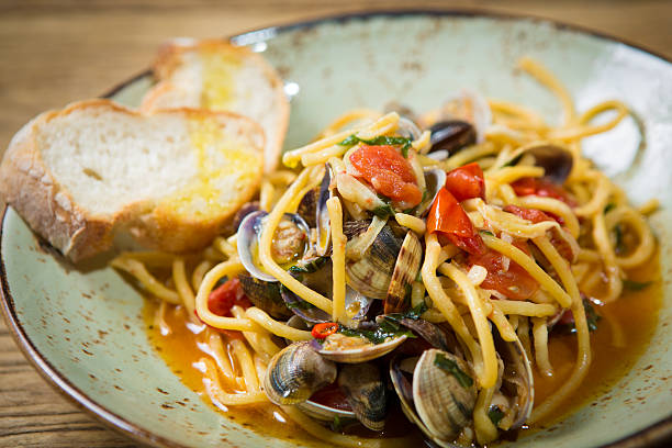 istock Homemade pasta with seafood and cherry tomatoes 504782157