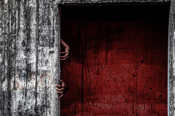 istock scary abandoned building with blood wall and ghost hand 504783644