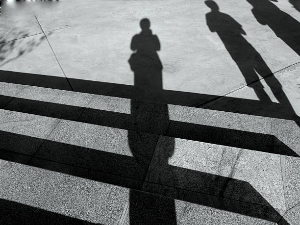 istock Shadows of people on the cement 504784904