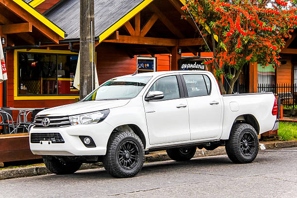 Pucon, Chile - November 20, 2015: Brand new pickup truck Toyota Hilux is parked at the town street.