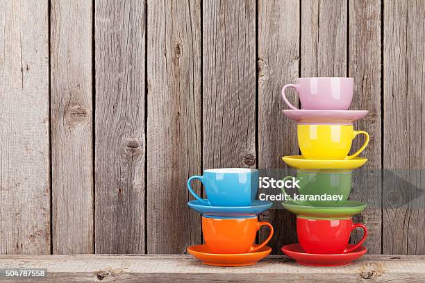 Colorful Coffee Cups On Shelf Stock Photo - Download Image Now - Cup, Mug, Multi Colored