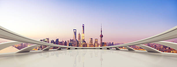 istock empty smooth floor and reflection of cityscape in blue sky 504788446