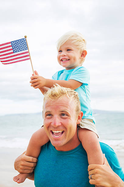 istock Father and son playing on the beach 504788523