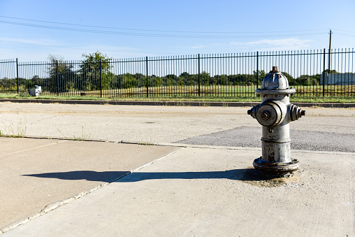 fire hydrant on urban sidewalk, essential emergency equipment for firefighters