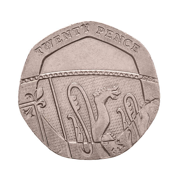 монета в 20 пенсов изолированные - twenty pence coin стоковые фото и изображения