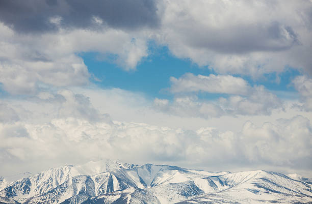 istock Snow-capped mountain peaks 504791752