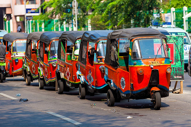 Jakarta, Indonesia - September 30, 2012: Rickshaws lined up and waiting for passengers in Jakarta, Indonesia