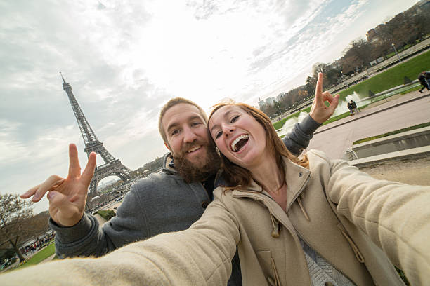 istock Young couple take selfie portrait at Eiffel tower, Paris 504795696