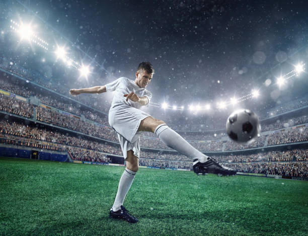 istock Soccer player kicking a ball 504795938