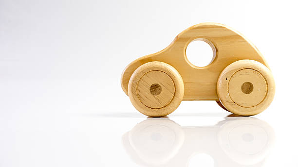 istock Wooden toy car. Isolated on white background. 504796534