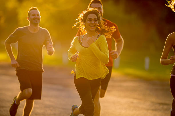 istock Running Together in the Park at Dusk 504816562