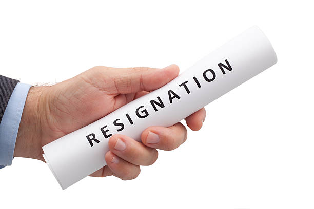 Letter of Resignation in a Hand with Clipping Path stock photo
