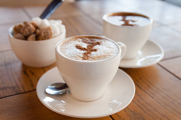 istock cups of coffee and sugar 504817627