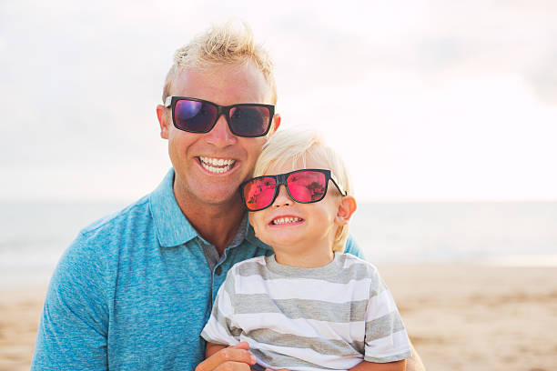 istock Father and son at the beach 504817693