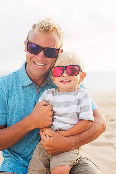 istock Father and son at the beach 504817695