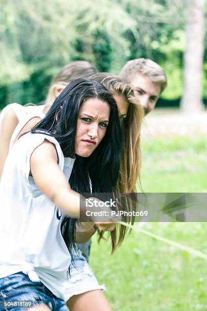 Group Of Friends Playing Tug Of War Stock Photo - Download Image Now - 20-29 Years, Adult, Aspirations