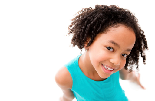 Beautiful African American girl smiling - isolated over white