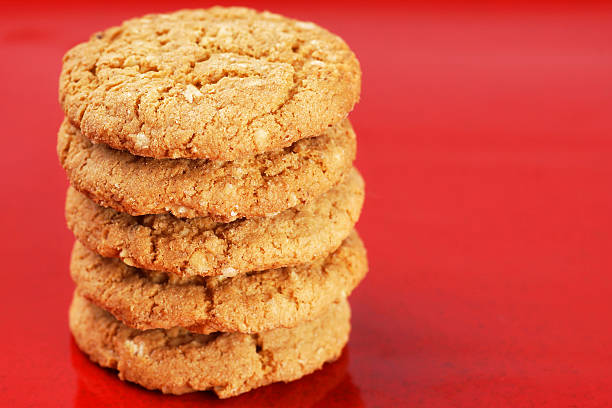 istock Stack of peanut butter cookies on red 504819427