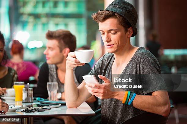 Young Man On Phone Stock Photo - Download Image Now - 20-24 Years, Adolescence, Adult