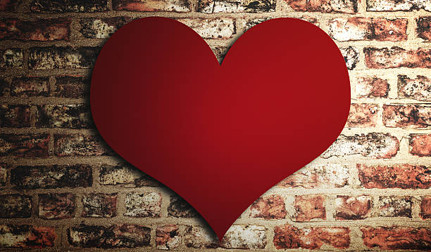 istock st. valentine heart shape on a brick wall 504819918