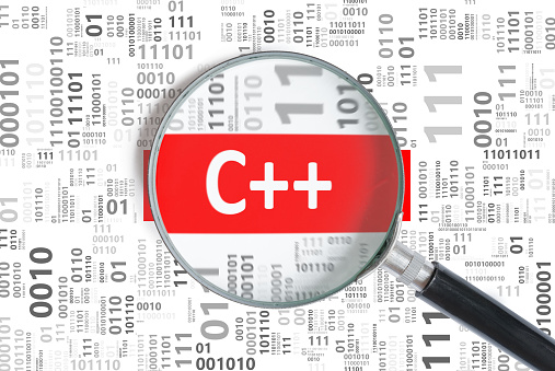Software development concept. C++ (C plus plus) programming language in binary code.