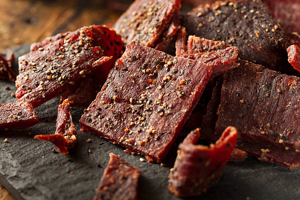 fotografii de stoc, fotografii și imagini scutite de redevențe cu uscate piperate carne de vită sacadat - pastramă