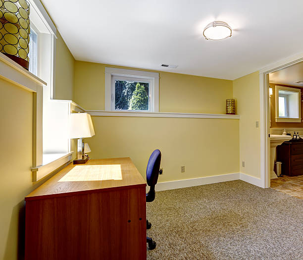 istock Empty office room with bookshelf and desk 504820183