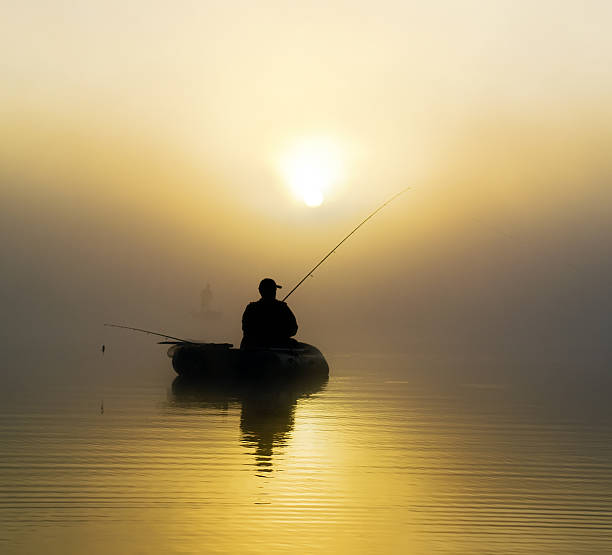 istock Fishermen in the morning mist 504821035