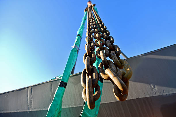 istock Heavy duty industrial chain on construction crane 504821624