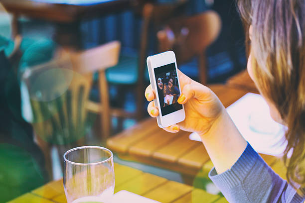 istock Best Friends Taking a Self Portrait with Mobile Phone 504822492
