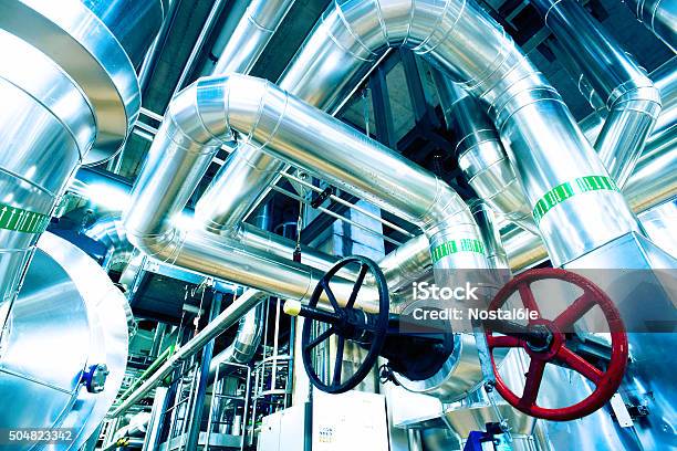 Different Size And Shaped Pipes And Valves Stock Photo - Download Image Now - Petrochemical Plant, Abstract, Barrel