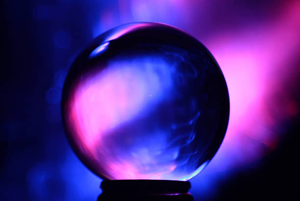 crystal ball pink and blue crystal ball pink and blue lighting crystal ball photos stock pictures, royalty-free photos & images